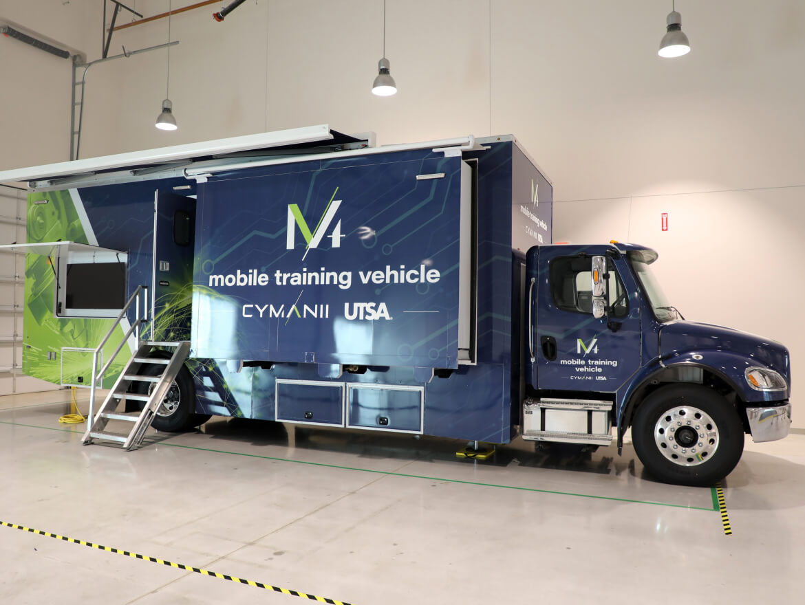A CyManII mobile classroom inside of a trailer truck.
